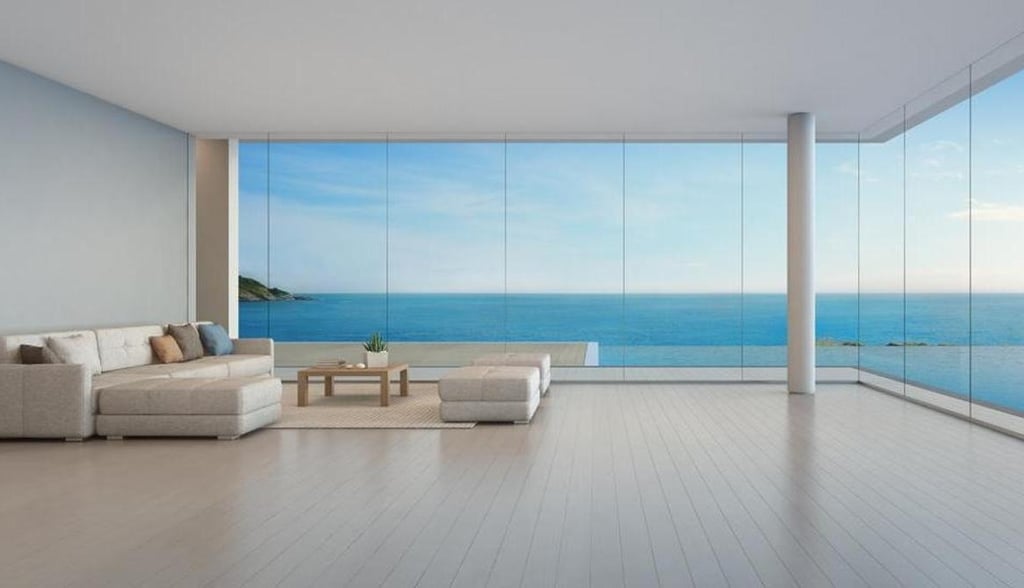 a living room with a couch and a large window