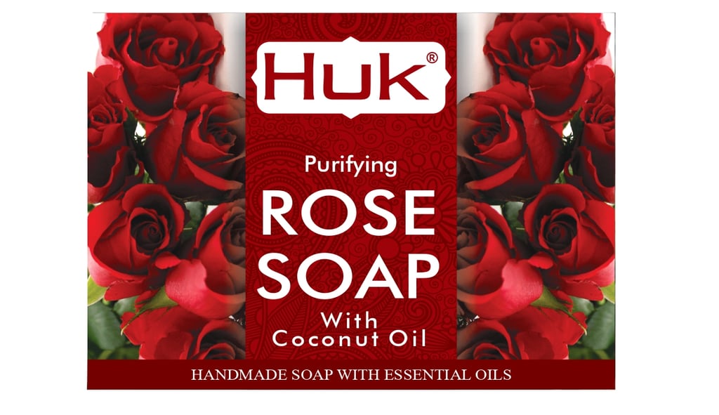 a soap bar with a red rose on it