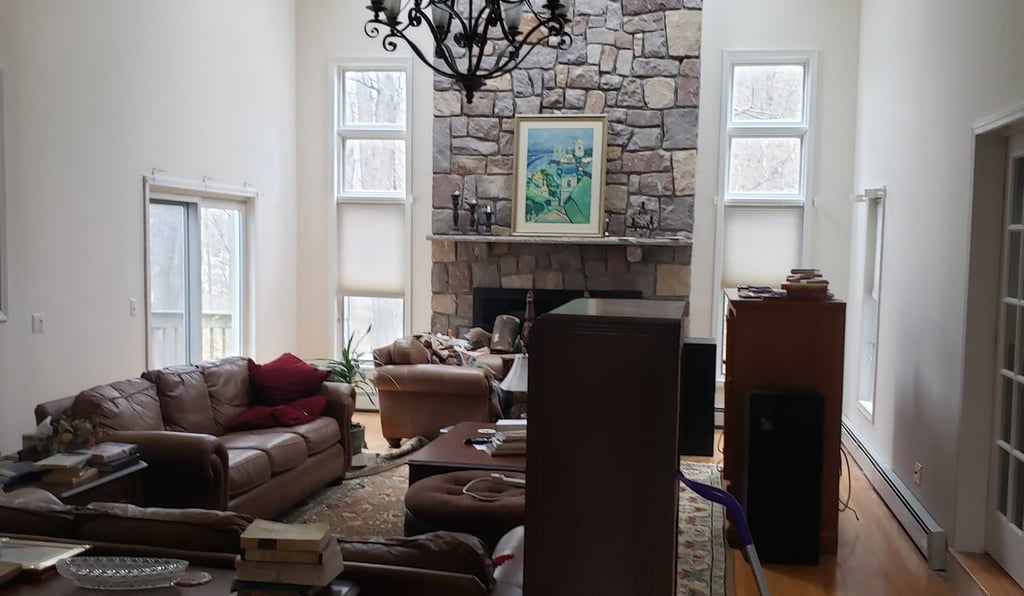 a living room with a chandelier and a chandelier
