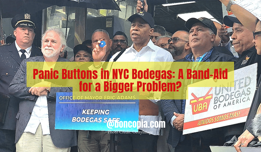 a man in a suit and tie is holding a sign that says panic buttons