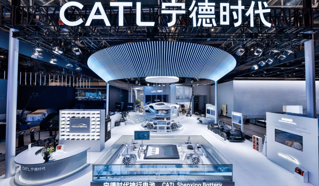 a display of a car showroom with a cat on display