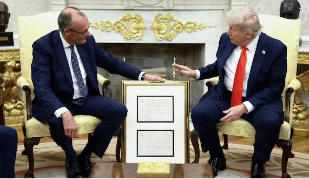 A Golden Gesture: German Chancellor Gifts Trump His Grandfather’s Birth Certificate in Oval Office Meeting