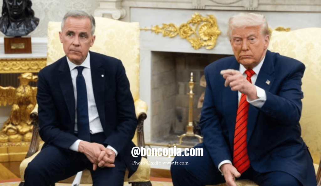 a man in a suit and tie sitting in a chair