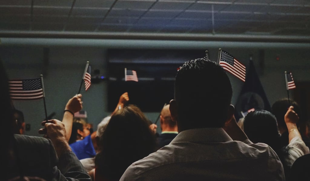 Close-up of a group with American flags, illustrating student experiences and cultural dynamics