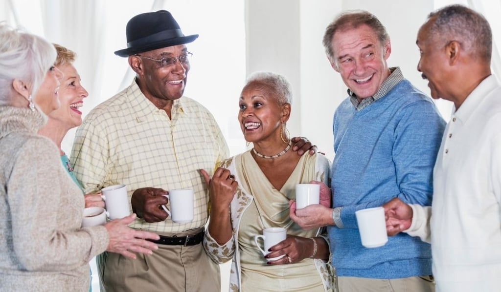 group of seniors having coffee