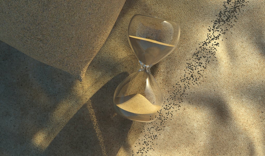 An image with an hour glass showing the passing of time