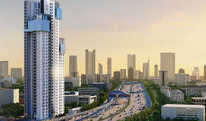 A vibrant city skyline featuring tall buildings against a bright sky, showcasing a mix of skyscraper