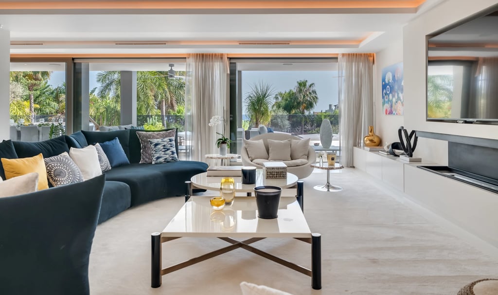 Contemporary designer living room at Villa Serenity, featuring elegant and stylish interiors