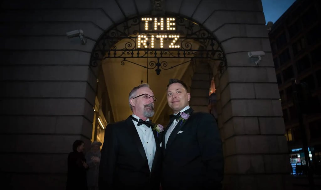 newly-weds standing outside The Ritz in London