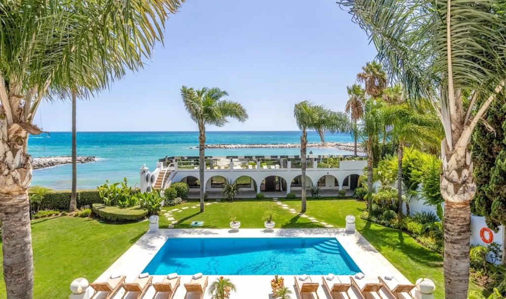 Beachfront garden and pool area in luxury villa Marbella near Puerto Banus