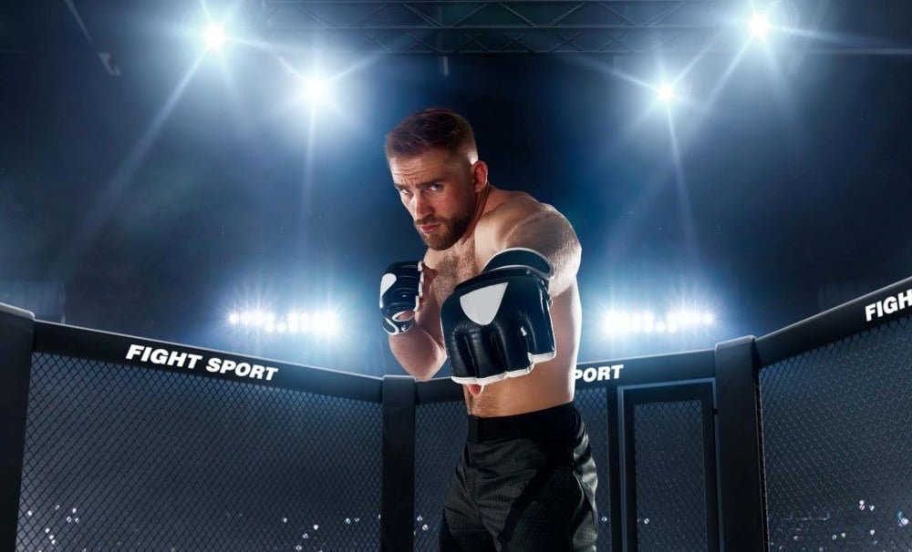 a man in a boxing ring with a boxing glove