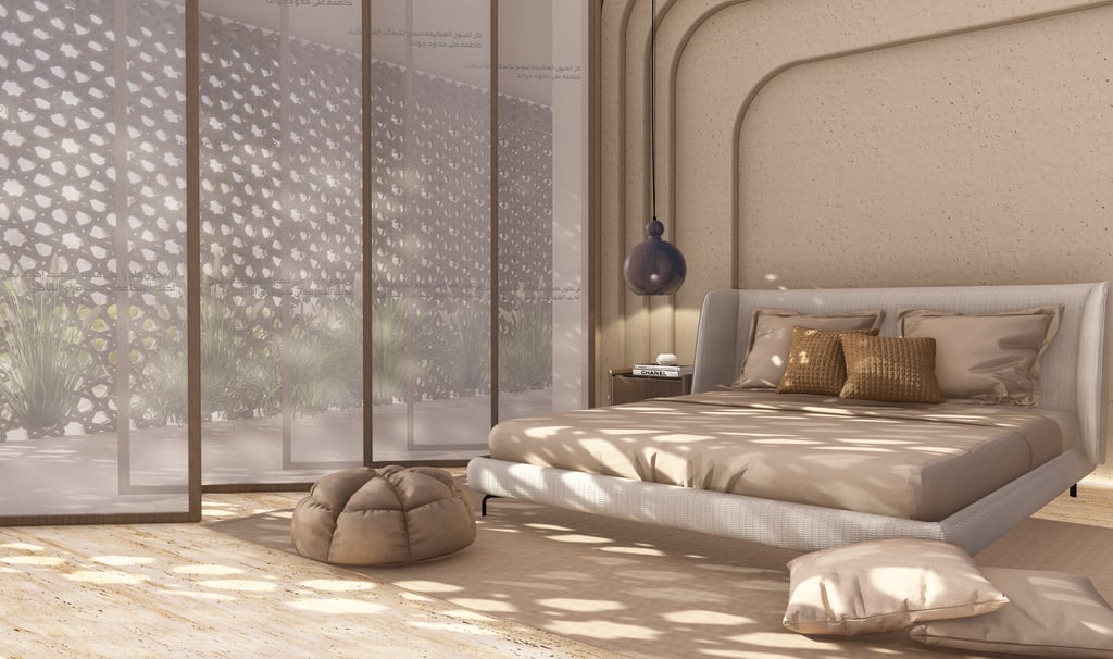 Serene bedroom at Etihad House with soft neutral palette, curved wall features.