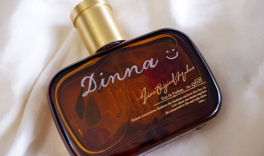 Engraved perfume bottle with name for a brand activation by Handwritten by Belle.