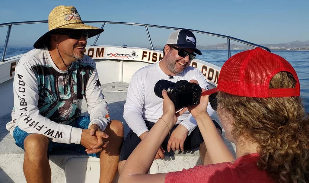 a group of people on a boat in the ocean