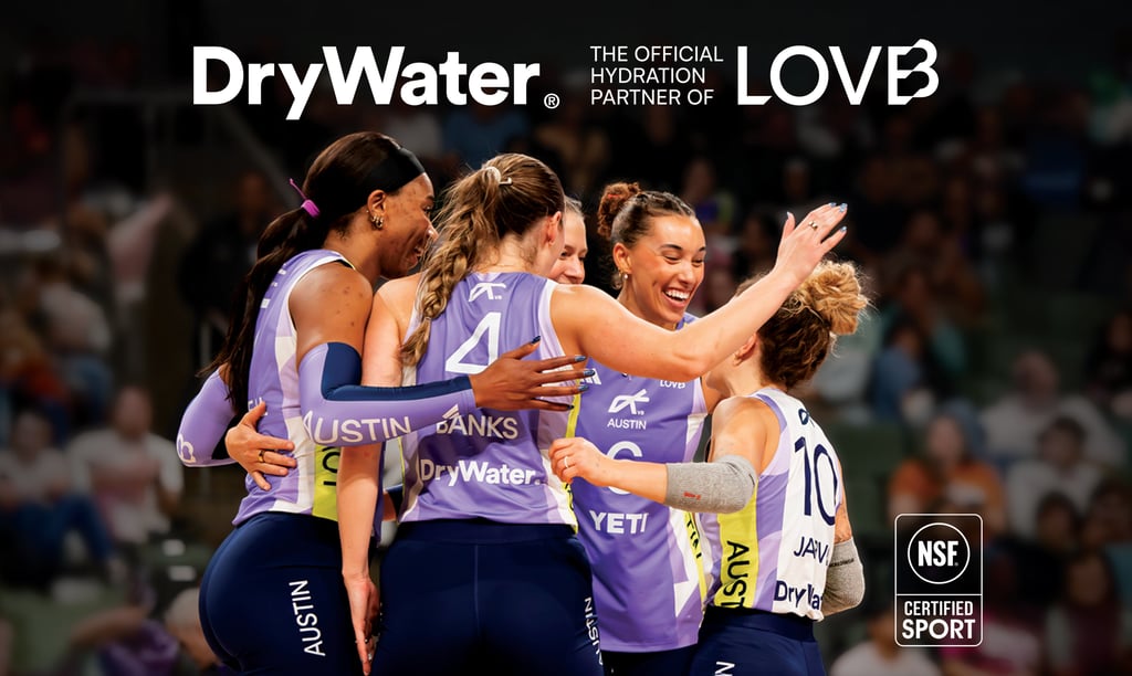 a group of women's volleyball players are all smiles and cheer 