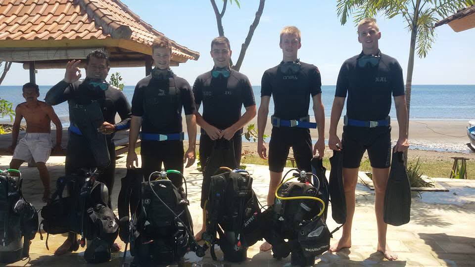 Students practicing diving skills at Lovina Reef with instructor, Sunrise Dive Bali