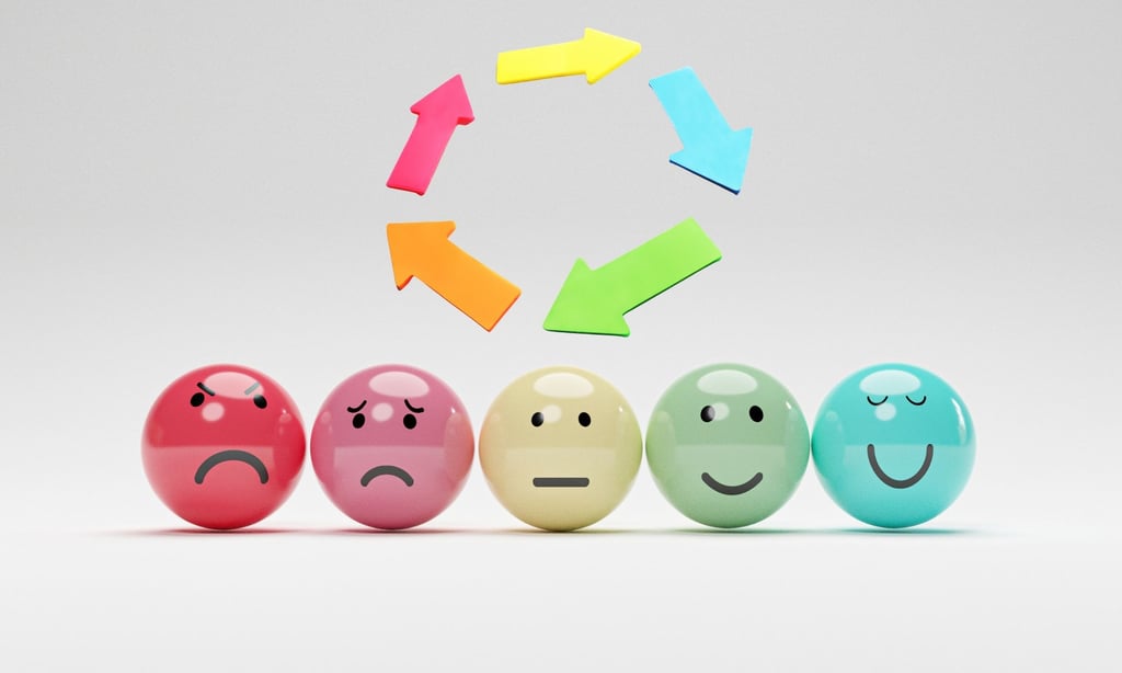 a group of balls with different faces on them