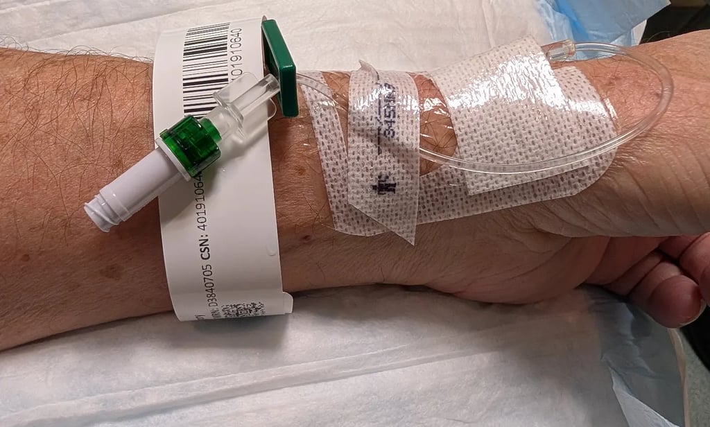 Greg Rowland's wrist with an IV port