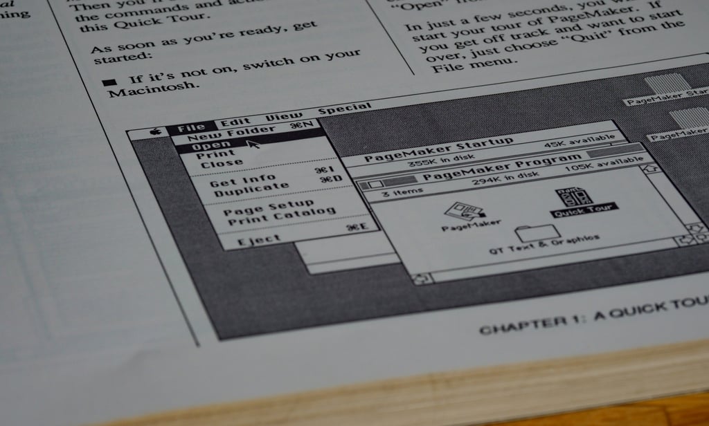 An illustration of a mobile notary reviewing documents with a client