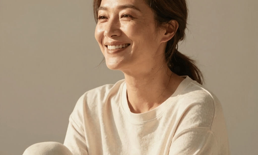 Woman over 50 with healthy skin representing collagen benefits during menopause