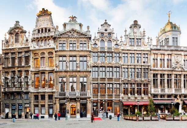 Ornate historic guildhall buildings with Baroque architecture at Grand Place in Brussels, Belgium.