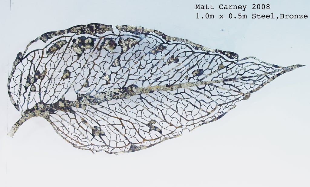 steel sculpture of a skeleton leaf