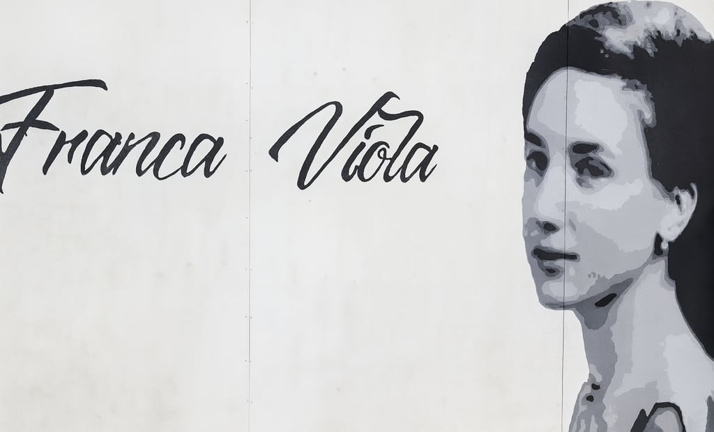 Mural dedicated to Franca Viola, symbol of freedom and courage, created by Poliops in Sicily.