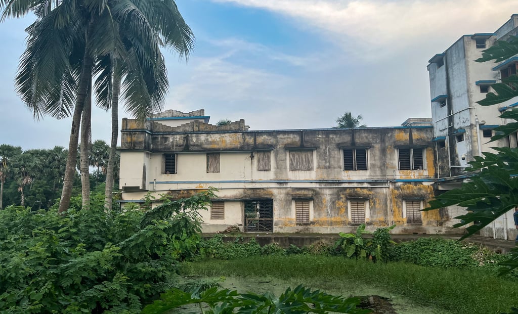Kalidaha Gohaldaha R.M. High. with pond and trees.
