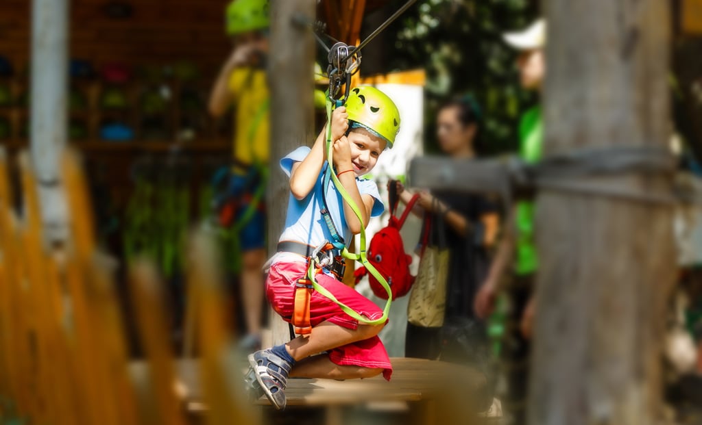 Child-on-course-rope-and-helmet