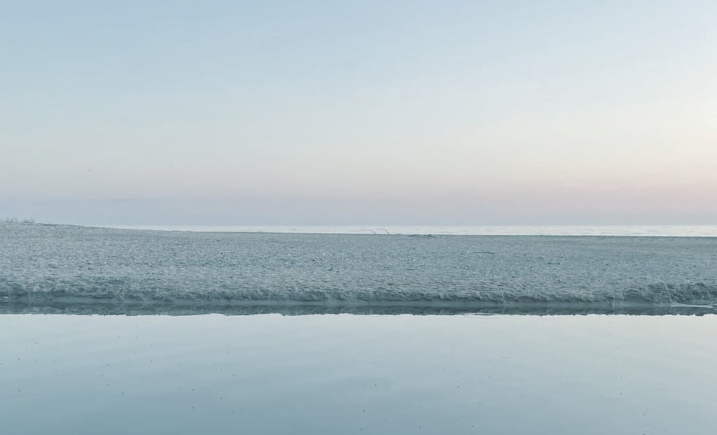 The picture shows the sea and colorful skies, which in this case symbolize a peaceful mind.