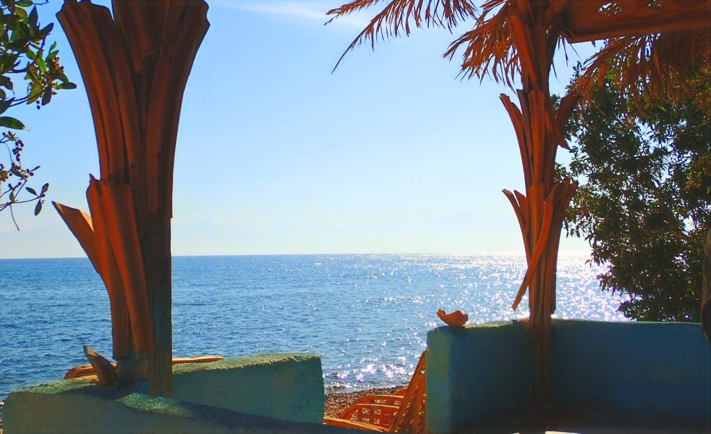 Watching the sea from our popular bungalow with shared bathroom first line