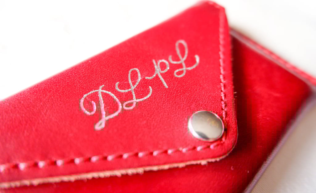 Leather purse personalized with initials using hot foiling by NYC calligrapher Handwritten by Belle.