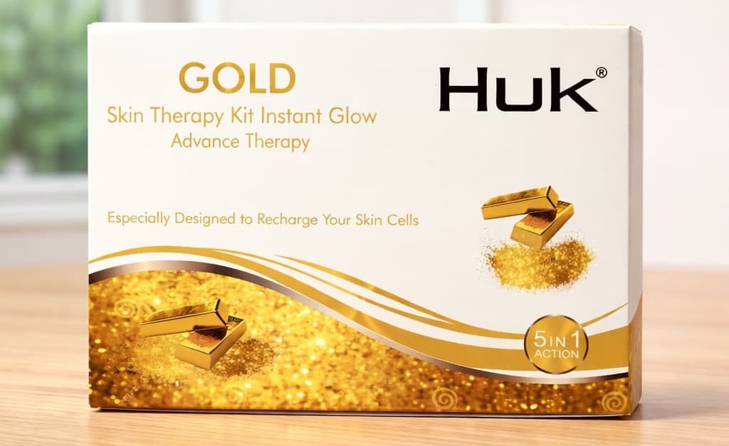 Huk Gold Skin Therapy Kit for instant glow and cell recharge in a luxury white and gold box.
