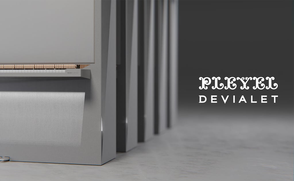 Close-up of a modern grey Pleyel Devialet piano design showing keys and sleek minimalist aesthetic.