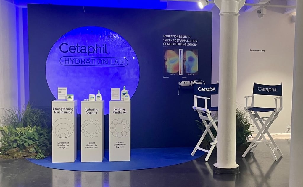Cetaphil Hydration Lab testing station with products.