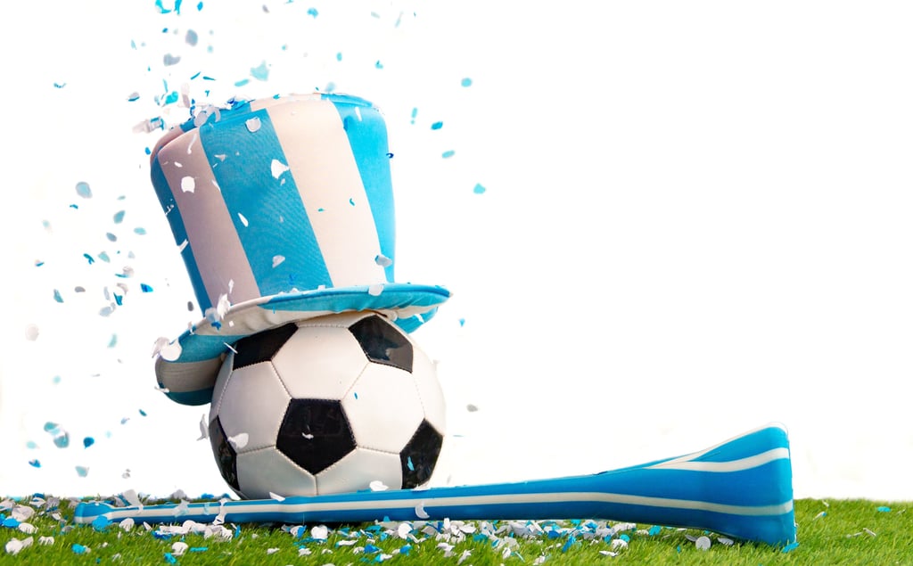 Football wearing an Argentinian Fan Hat
