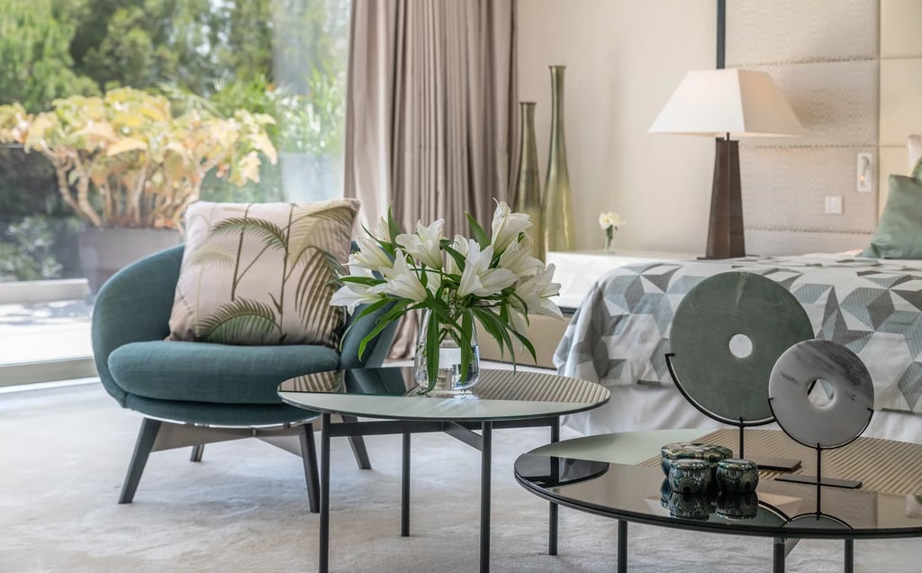 Elegant sitting area with floor to ceiling windows
