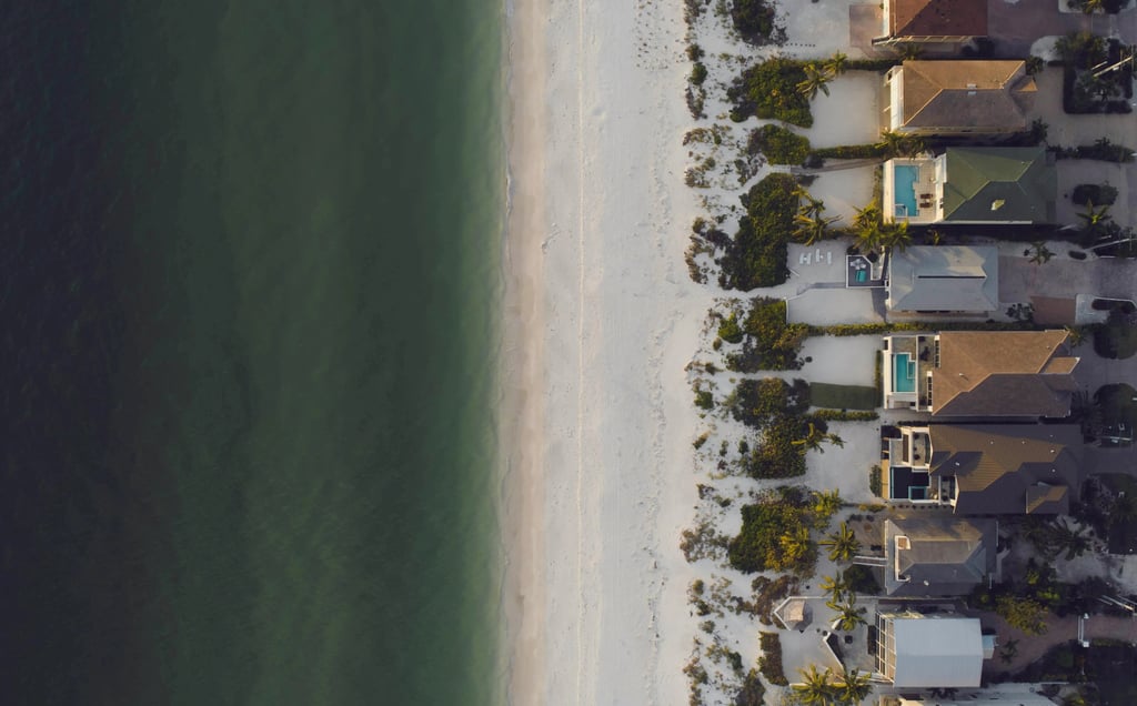 Long stretch of beach homes along the coast