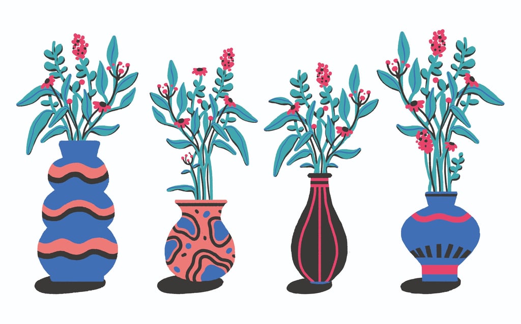 a group of vases with flowers in them