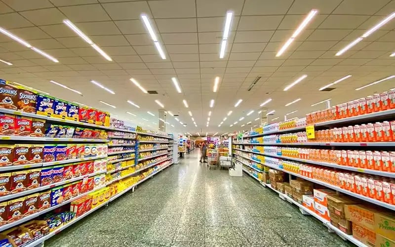 Retail supermarket aisle with energy-efficient linear and recessed LED lighting Victoria BC