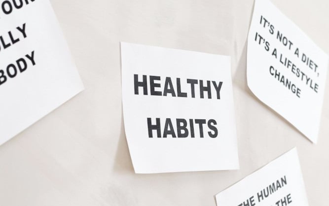 a group of paper cutouts with words on them