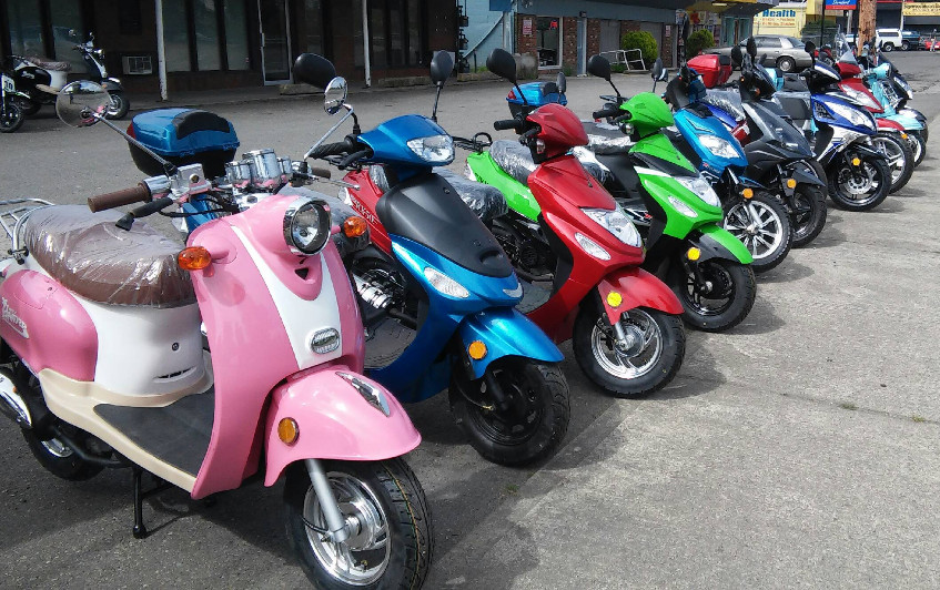 moped and scooter models on display