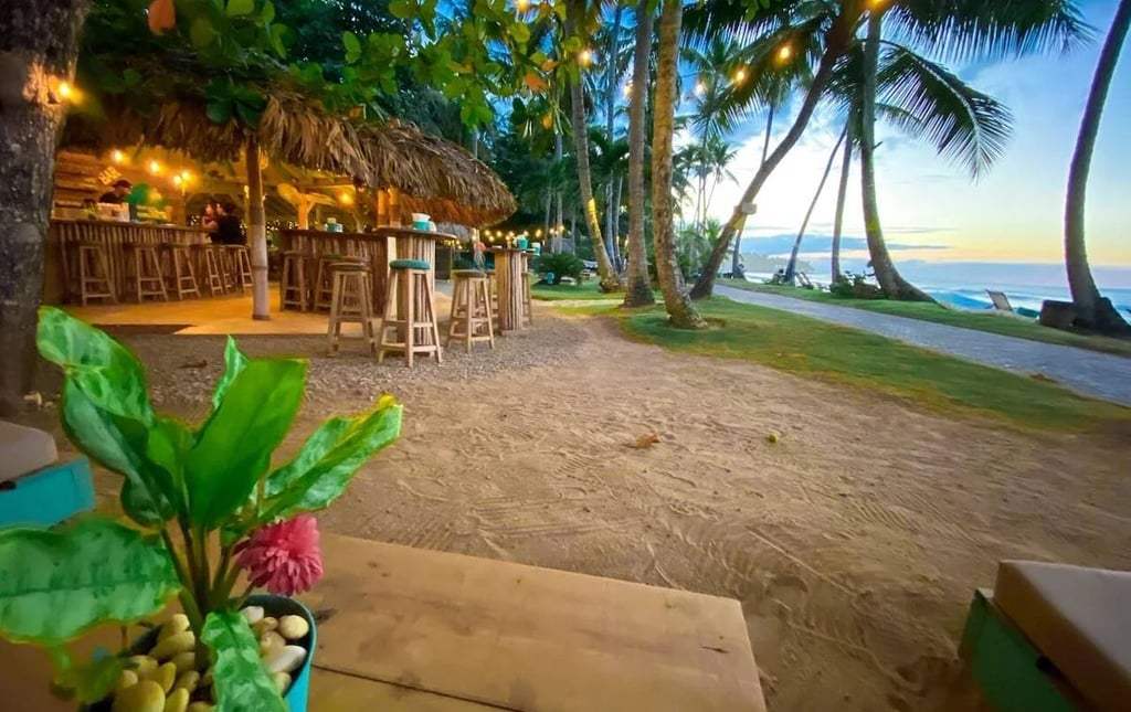Mosquito Boutique Hotel beachfront bar at sunset in Las Terrenas, Dominican Republic