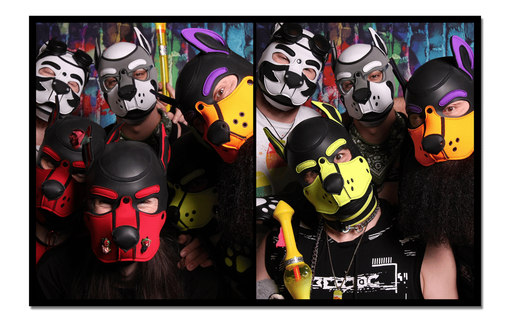 Friends posing in pup masks.