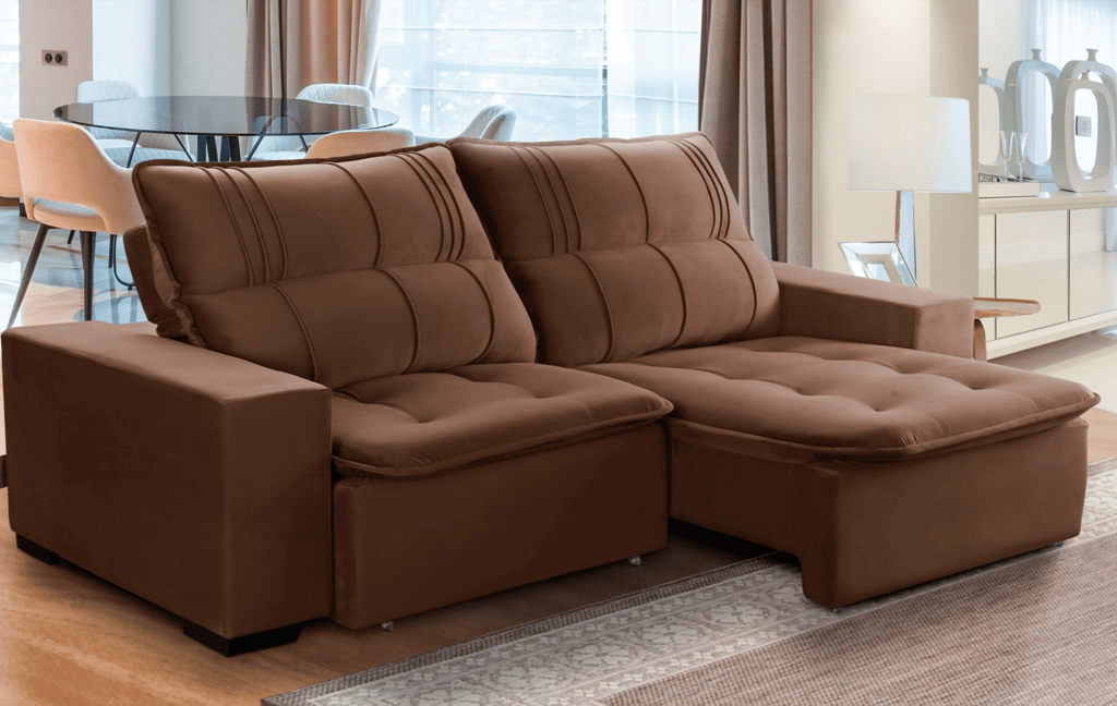 a couch with a chair and a table