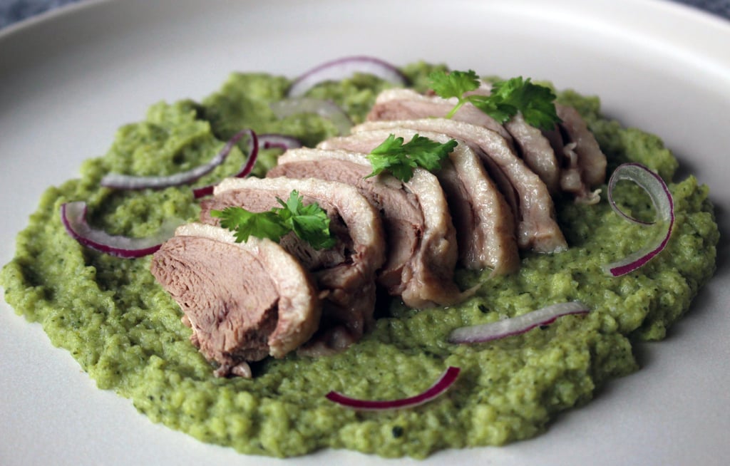 a plate of aromatic salted duck with broccoli puree