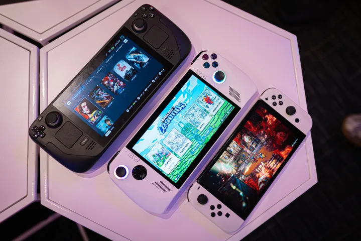 a couple of nintendo wii game controllers sitting on a table