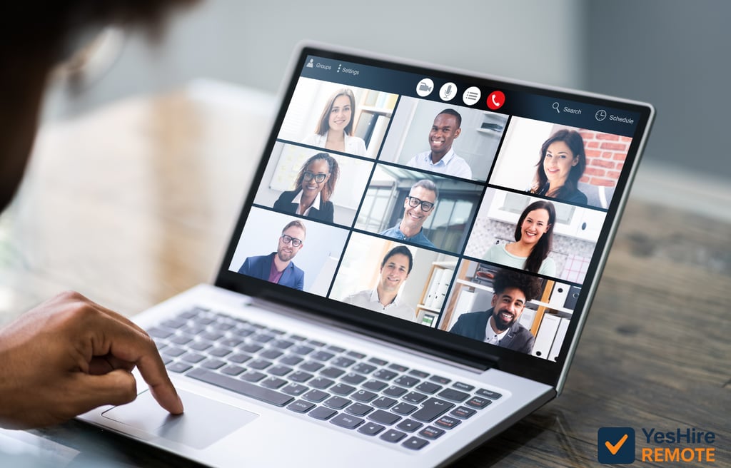 A small business team collaborating remotely through video call, showcasing modern remote-first work