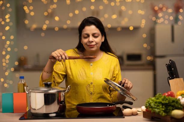 a woman enjoying the smell of a food