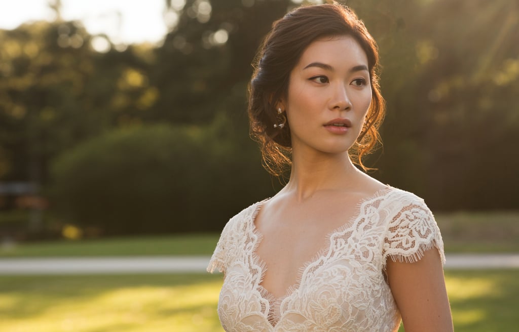 a woman in a wedding dress with a white dress